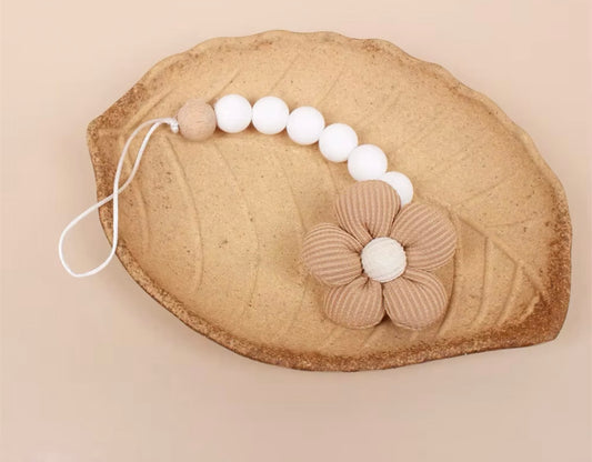 Attache tétine fleur taupe